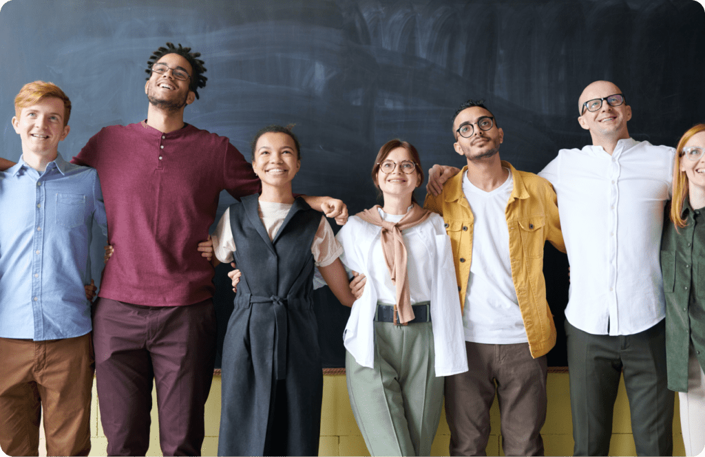 People standing together in a shared workspace
